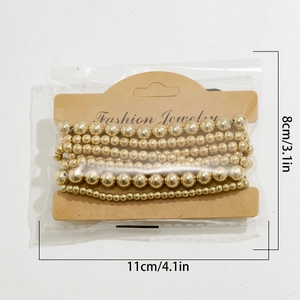 Detailed view of beaded heart pendant bracelet packaging with dimensions 8cm by 11cm