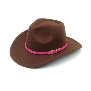 Dark brown wool felt cowboy hat with pink leather belt and gold buckle on white backdrop