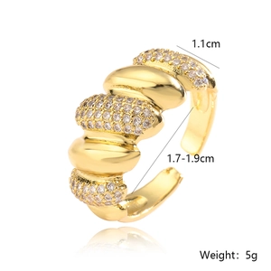 Detail showing 1.1cm width and 5g weight of gold plated zirconia open ring
