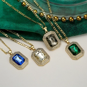 Luxurious gold-plated necklaces with emerald-cut crystals in four colors on Figaro chains