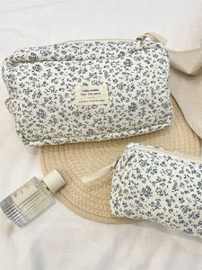 Quilted cotton floral cosmetic bag set including large and medium travel wash pouches