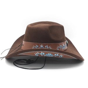 Detailed embroidery on brown felt western hat with blue floral patterns and leather band
