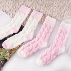 Thick coral fleece striped sleep socks for women in pink and white cable knit texture