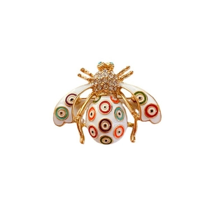 Baroque vintage bee brooch in gold with colorful evil eye enamel wings and crystals