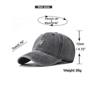 Detailed size guide of a dark grey washed cotton baseball cap with heart embroidery