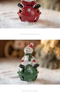 Close-up of red Santa and green Snowman metal bells for Christmas tree decoration