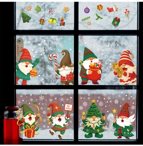Detailed view of Christmas gnome static window clings with snowflakes and candy decor