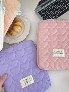 Quilted heart pattern iPad and laptop sleeve in pastel pink, purple and orange tones