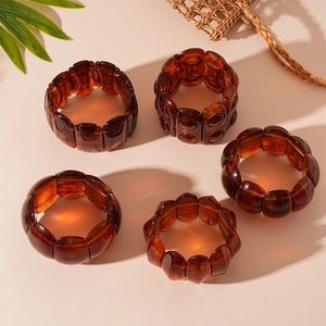 Amber acrylic elastic geometric bangles set in warm minimalist vintage tortoiseshell style