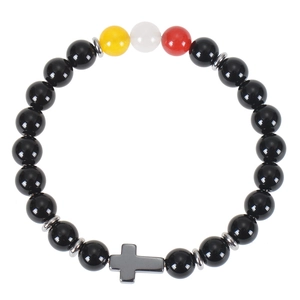 Black obsidian beaded bracelet with yellow accents and dark grey cross pendant