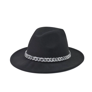 Detail of black wide brim felt hat featuring a marble textured resin decorative chain link