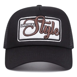 Classic black trucker hat with 3D embroidery and breathable mesh back on white background
