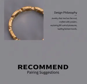 Detailed close-up of a minimalist 18k gold plated hollow bamboo style stackable ring