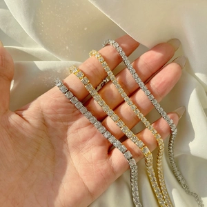 Elegant 925 sterling silver tennis bracelets in gold and silver finish with sparkling zircons