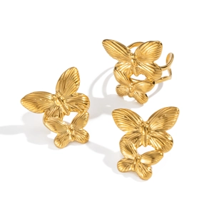Elegant 18K gold butterfly jewelry set featuring textured earrings and matching ring
