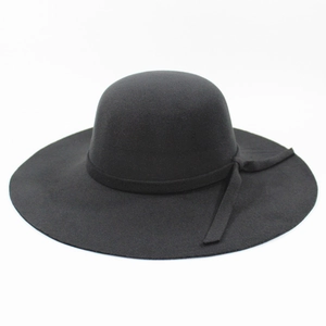 Elegant black wide brim wool felt fedora with ribbon bow accent for women fashion
