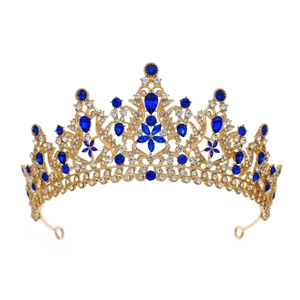Detail of luxury gold alloy crown featuring blue and white rhinestones for bridal hair