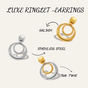 Close-up of geometric layered double hoop earrings in gold, silver, and two-tone finish
