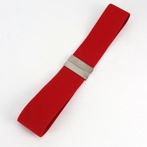 Detail of red elastic waist belt for dresses with silver rectangular metal buckle