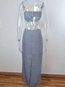Détail de l'ensemble top et jupe longue en tweed avec fermeture éclair et motif à carreaux