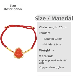 Detail view of red rope bracelet with 18K gold plated Buddha pendant and zircon stone