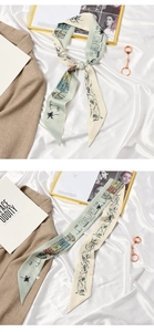 Detail of silk hair scarf featuring vintage European architecture and floral patterns