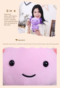 Detailed embroidery and soft plush texture of Axolotl stuffed animal in pink and purple