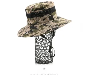 Detail view of camouflage sun hat featuring breathable black mesh and wide brim design