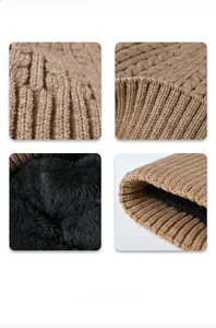 Detail of winter knit beanie showing khaki cable pattern and thick black fleece lining