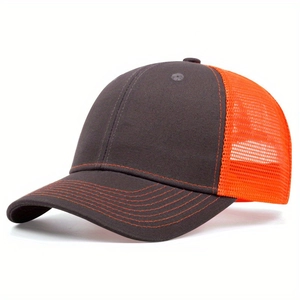 Detail of charcoal grey trucker hat featuring breathable bright orange mesh and contrast stitching