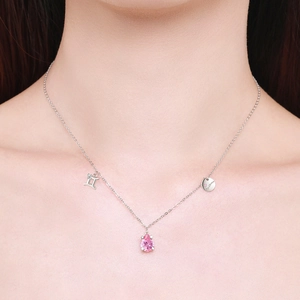 S925 sterling silver Gemini necklace with pink teardrop gemstone and celestial charms
