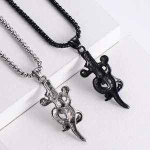 Punk style snake and sword pendant in black and vintage silver stainless steel