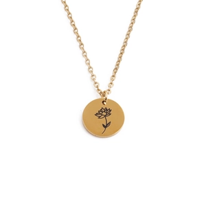 Gold stainless steel necklace featuring a minimalist round pendant with floral engraving