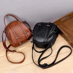 Retro faux leather crossbody phone bag in black and brown with multi-zipper compartments