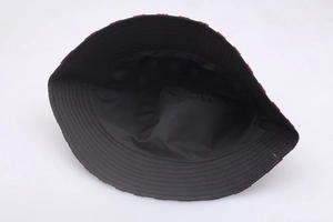 Double-sided sun bucket hat with red and white US flag pattern and black interior lining