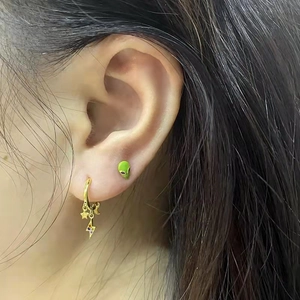 S925 silver needle star moon lightning hoop earrings with green alien stud on model