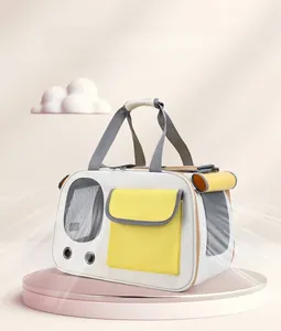 Detail view of white pet carrier bag with breathable mesh window and yellow pocket detail
