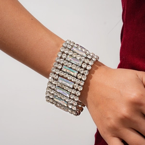 Macro view of multi-layer wide bracelet featuring sparkling round and rectangular rhinestones