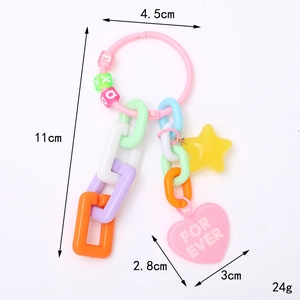 Pink acrylic keychain with colorful stars, heart charms and detailed dimension markers