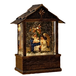 Bronze Christmas nativity scene lantern with swirling glitter and biblical figurines
