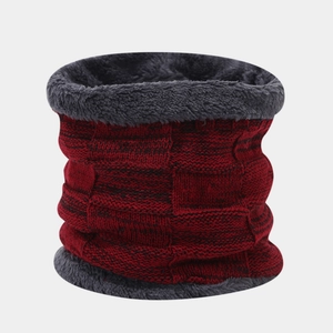 Detail view of winter neck warmer with red and black checkered knit and soft plush lining