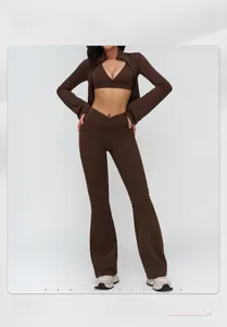 Detail of dark brown yoga set featuring a stand collar jacket and flared leggings
