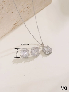 Detailed view of silver square zircon necklace and earrings set with 1.4cm dimensions