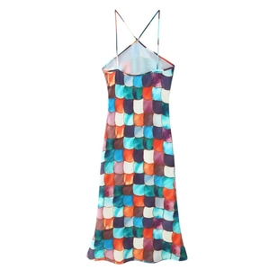 Women's sleeveless maxi dress featuring a vibrant colorful fish scale print for beach parties