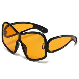 Y2K oversized wraparound sunglasses with chunky black frames and orange lenses