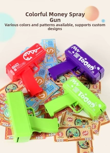 Close-up of colorful party money guns in red, purple, and green with custom logos