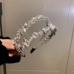 Detail of luxury rhinestone headband set with crystal rectangles and sparkling zircon