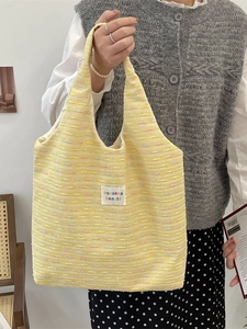 Sweet knit tote bag in yellow with colorful texture and shoulder strap carry