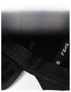 Close-up of the widened sweatband with moisture-wicking fabric on a black winter cap