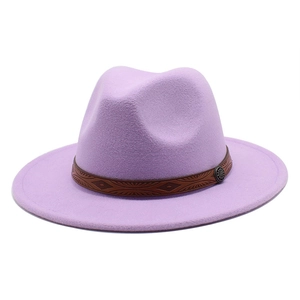 Detail of wool fedora with brown leather band and antique bronze buckle accent